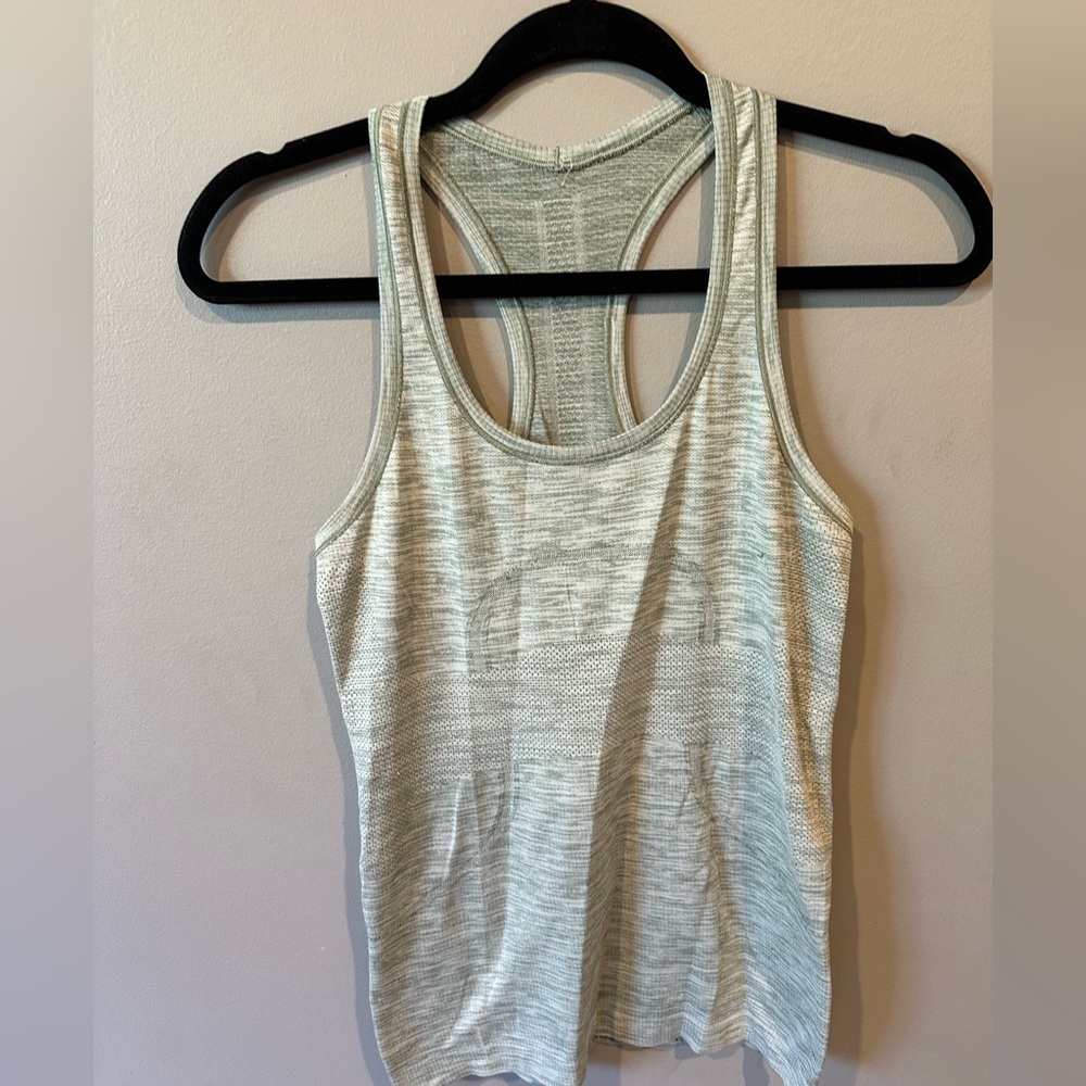 Lululemon Swiftly Striped Tank

Please look at photos 2 small snags